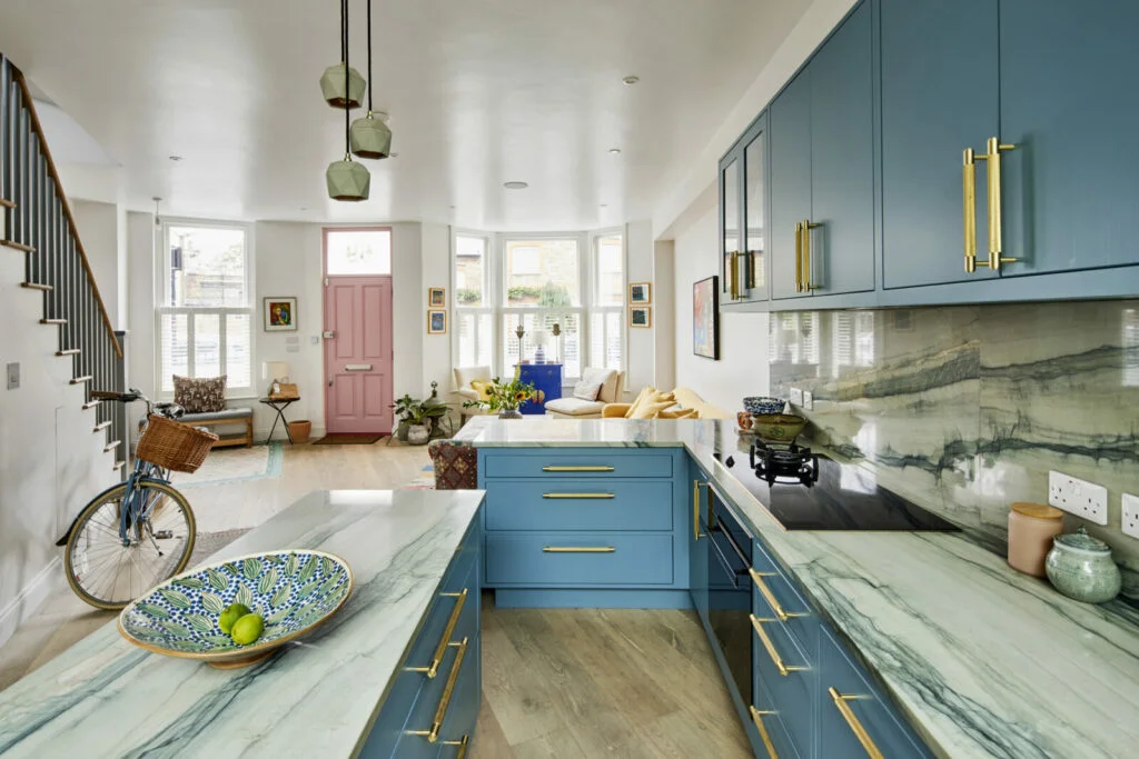 overview of a home's kitchen, living room, and entryway