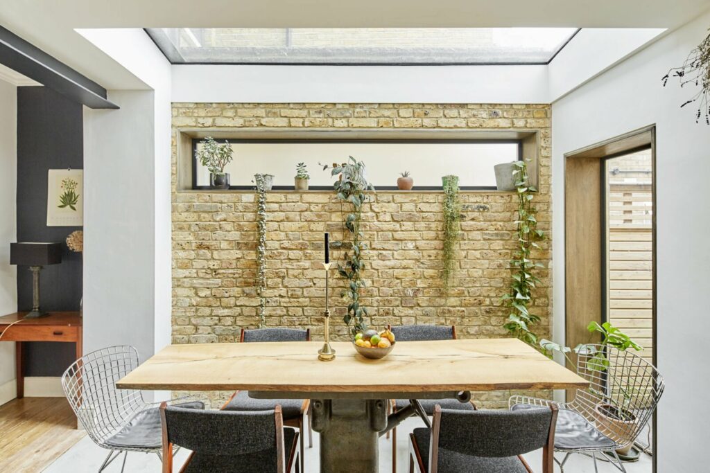dining room with a skylight